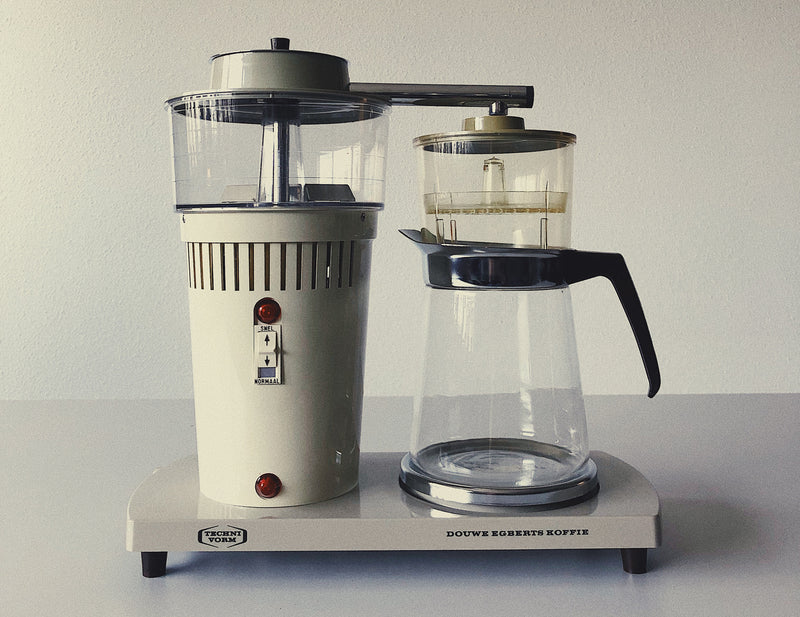 The iconic moccamaster model 68 is pictured, featuring a vintage design and smooth lines