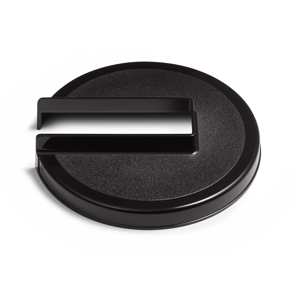 Round, black, plastic brew basket lid for most Moccamaster coffee brewers.