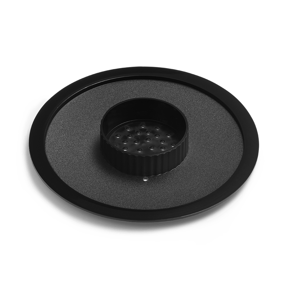 A flat, round brew basket lid compatible with the Moccamaster CD Grand and CDT Grand