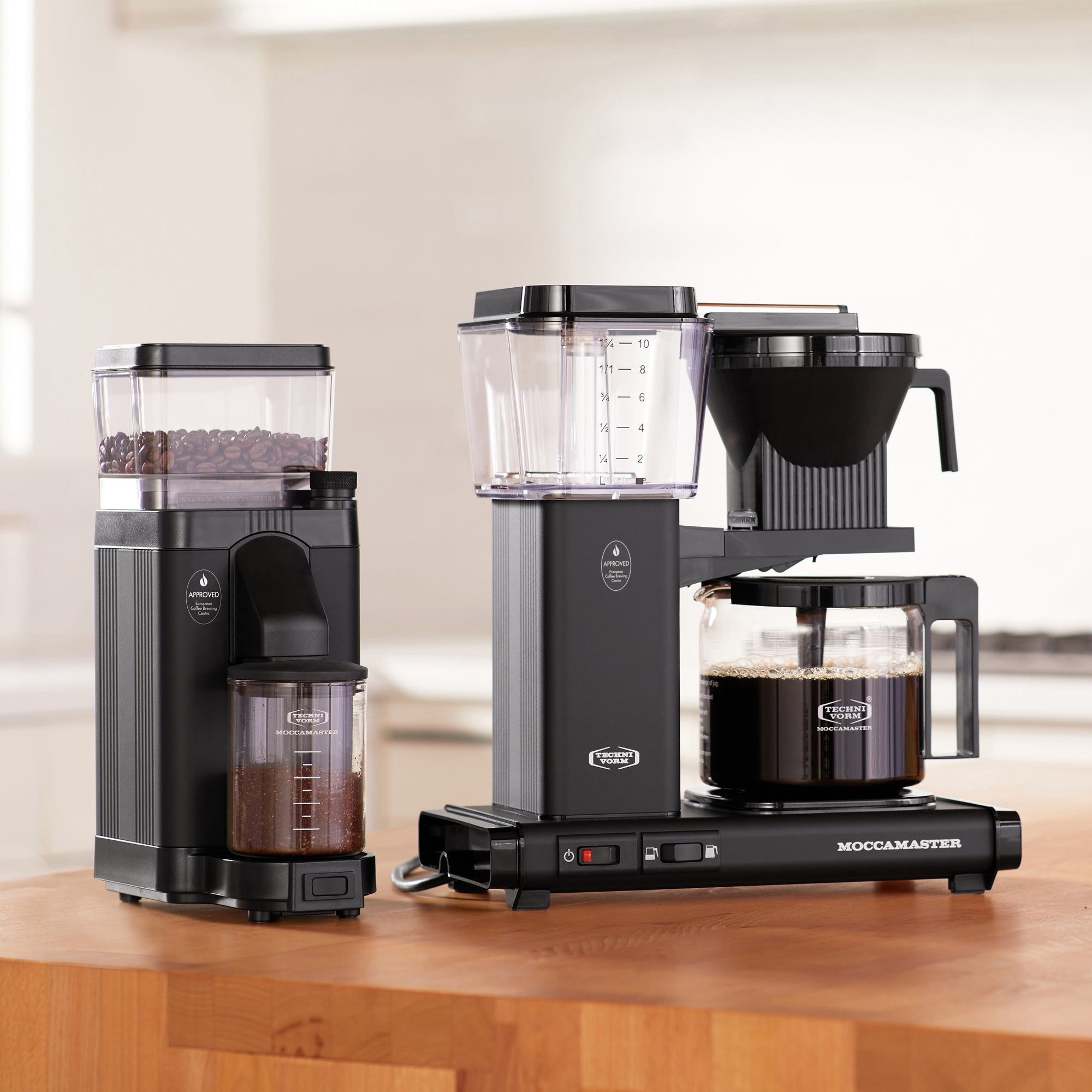 Black coffee grinder and coffee brewer