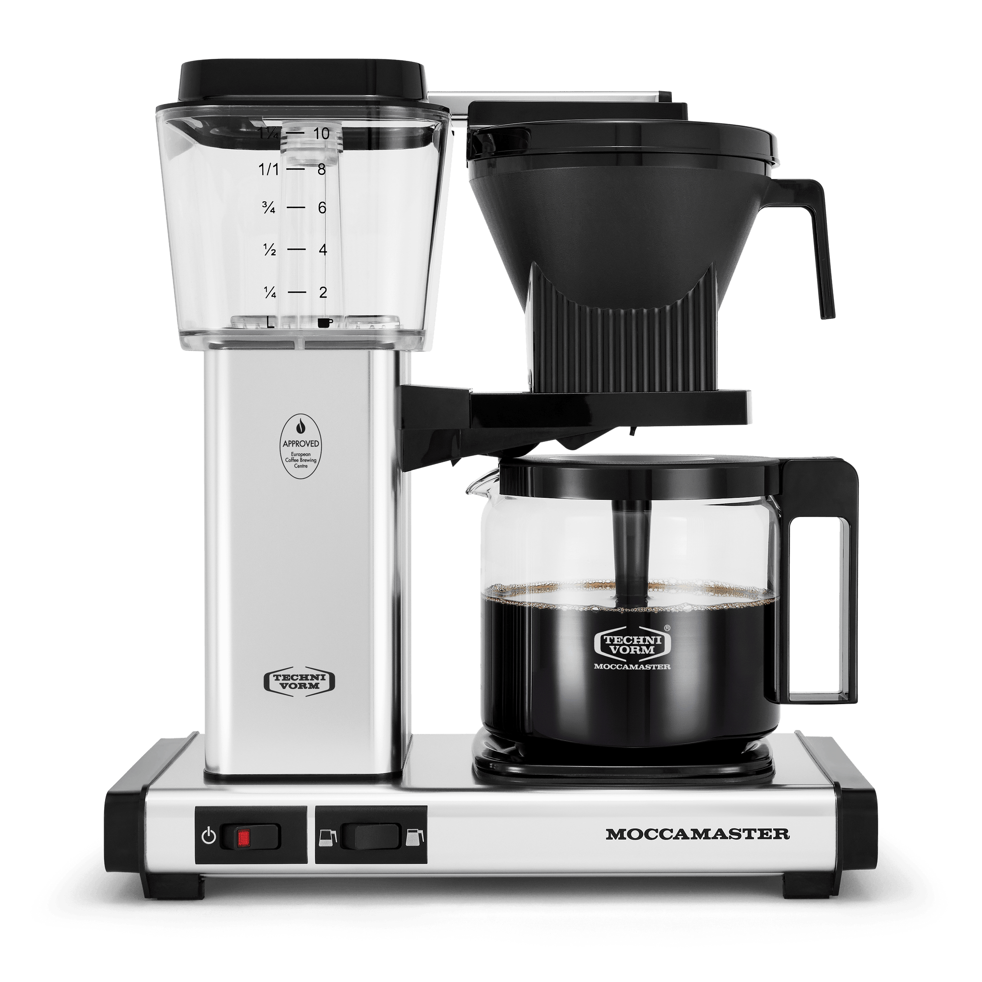 Front shot showing Moccamaster KBGV Select in Polished Silver, with rectangular tower and base, clear acrylic water reservoir with fill level marks, power and volume selector switch, glass carafe with black handle, and black automatic brew basket.